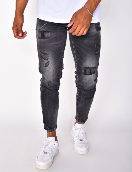Jeans in Destroyed-Optik mit Ketten und Aufschrift Icon