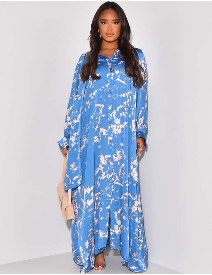 Long flowing shirt dress with pattern and bow at collar