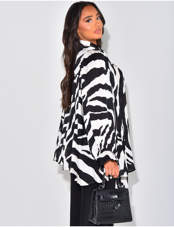 Pleated blouse with zebra print collar and tie fastening